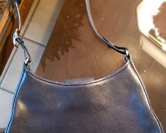 $20 - Item #214B: Vintage Coach purse. Does have some scuff and discoloration. Did not look up the serial numbers. Leather? D1K-8319