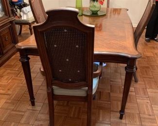 $175 - Item #222: Table with 6 lattice back chairs, 2 arm chairs have upholstered backs also. 2 leaves and fitted table pad. Without leaves 72" long, 43" wide and 29.5" high