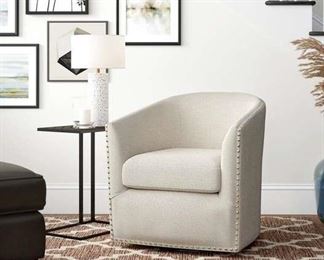 Three Posts Leominster Swivel 19.5" Barrel Chair