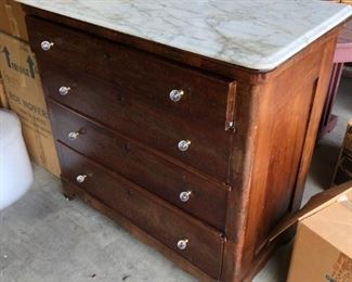 Antique chest of drawers with marble top
