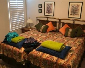 two twin beds w headboards & frames.