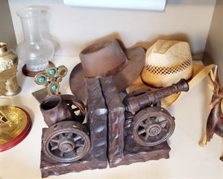 $40 - Cannon Book Ends $10 each - Hats $10 - Deer $10 - Brass Book Ends $10 - Brass Vase $15 Candle Lamp