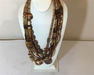 3 Brown Wood or Agate Necklaces https://ctbids.com/#!/description/share/373936