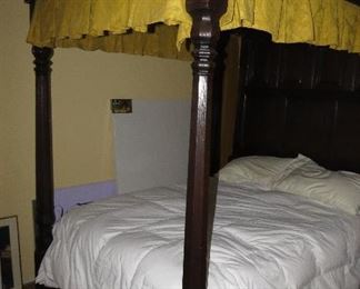 Late 16th or Early 17th century tester type. European oak, foot posts carved from 4.5”x435” oak, 86” high oak panel headboard, four oak panels at bottom of headboard with three oak panels in center, 4 cathedral type panels in top. 88” high. Canopy is solid oak with 10 panels, flat springs and oak headboards. The gold canopy was made with fabric similar to what would have been used at the time. This was a barn find in England by a US Army officer while posted to a nearby military base. An expert in England, straightened some of the wood pieces and cleaned them. There was no sanding or any other restoration. It is a functioning bed.
