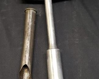 Vintage metal hammer with a tube
