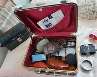 Case with vintage camera equipment  $150