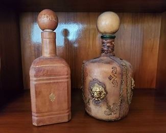 1506: 2 Leather Wrapped Decanters
Approx 9" tall