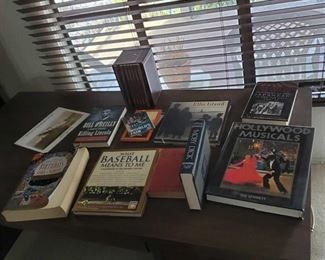 Collection of Books approximately 17 books
Baseball,Lincoln, Ellis Island, Moby Dick, Hollywood Musicals, Surviving the Sword, Let me love you one day at a time, I Shoukd of Been a Cowboy and More