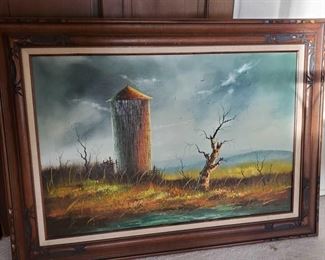 Vintage Oil Panting with Frame by Everett Woodson
Measures 44" long 35" tall
Missouri - Known for "Rural scenes with Barns"
Everett Woodson was born September 3, 1933 in Independence Missouri. He is known for his "barn" paintings. The central theme of his paintings are barns in different types of settings, seasons and locations. Collectors of Woodson's work often will seek particular settings or certain seasons over others. His very large oil paintings are especially prized.
It is not surprising that Everett followed the same path as his ancestors, several of whom also achieved national recognition as professional artists. Woodson received his formal training at the Academy of Fine Arts in Kansas City. Mr. Woodson has earned several awards for his farmhouses and barns including first place at the Missouri State Fair, Mid-America Fine Arts League, and at the Truman Bi-Centennial.
Mr. Woodson's genius is tied to reality and vividness of his subjects. "His barns are weathered and