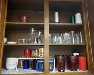 4 Cupboards Full of Glassware and More!
Items include plastic cups, glass cups, glass bowls, glass plates, cookie jars, tea box and more!