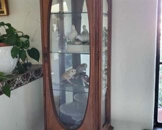 Wooden Display Cabinet with Figurines, Glass Dish and Basket
Measures approx 21" x 14" x 71" Cabinet is fastened to wall