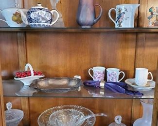 Tea Pits, Tea Cups, Glass Punch Bowl, Pitcher, Candy Dish and more
Also includes table linens, napkin rings, figurines and more
