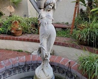 Statue Fountain and Metal Tower measures approx 5'2. Metal Tower measures approx 24"