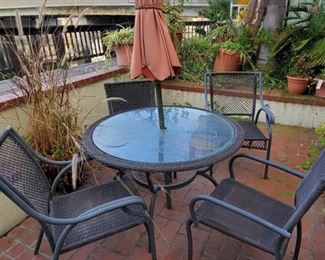 Glass Top Wicker Patio Table with 4 Chairs
Table measures approx 44" x 27"