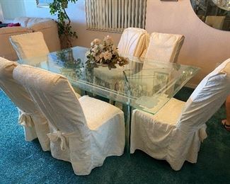 Etched glass table with 6 chairs. 