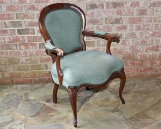 42. Upholstered Victorian Mahogany Armchair