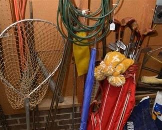 fishing net, extension cord, ladies golf clubs