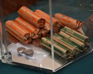 rolls of silver quarters and dimes, bag of Barber dimes