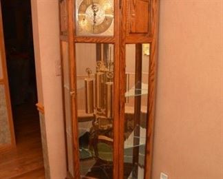 Howard Miller grandfather clock curio cabinet