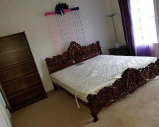 Bedroom #2: ornate wooden carved flowers King bed frame with mattress.  Bed with mattress: 195.00