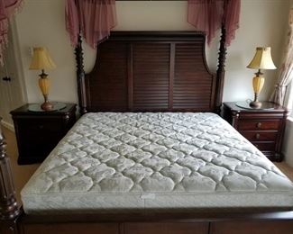 King size 4 poster canopy bed w/ mattress. Wood frame and posts. Bed w/ mattress:  $310.00