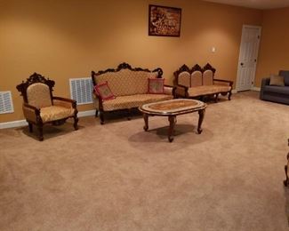 Lower Level: ornate wooden, hand-carved furniture brought from India 25 years ago. 3 sofas, 2 chairs, coffee table...