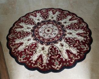 round area rug. 48".  $65.00