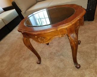 Lower level: round coffee table.  $25.00 AS-is