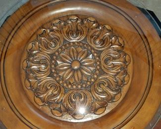 Entrance: metal/carved wood table w/ glass top. 28" round x 30.5" tall.    Round table:  $65.00