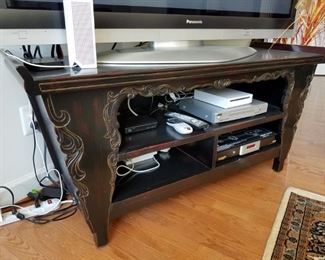 Great room-rectangular wooden TV stand, carved front & legs.  TV stand ONLY: $40.00