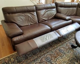 Leather sofa: $1,400.00.  Rug is SOLD