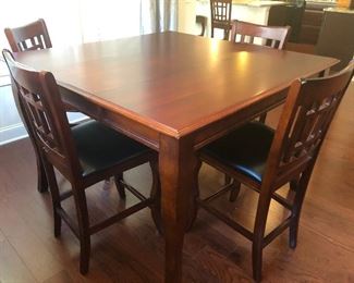 Pub table with leaf and 6 chairs and pads, really good condition - $195