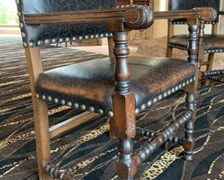 2pc Rustic Hand Tooled Leather, Carved Wood Highback Chairs	54x24.5x24.5. Seat Height: 21in	HxWxD	SC110