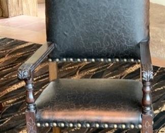 2pc Rustic Hand Tooled Leather, Carved Wood Highback Chairs	54x24.5x24.5. Seat Height: 21in	HxWxD	SC110