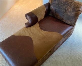 Custom made cowhide & scrolled leather lounge chair	31x67x30	HxWxD	DL4252