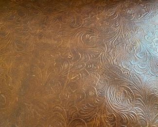 Custom made cowhide & scrolled leather lounge chair	31x67x30	HxWxD	DL4252