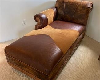 Custom made cowhide & scrolled leather lounge chair	31x67x30	HxWxD	DL4252