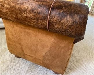 Custom made cowhide & scrolled leather lounge chair	31x67x30	HxWxD	DL4252