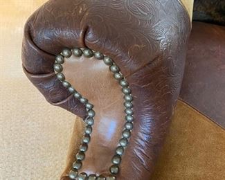 Custom made cowhide & scrolled leather lounge chair	31x67x30	HxWxD	DL4252