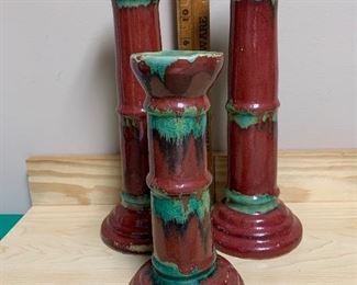 #860P - Three pottery candesticks - $25.00