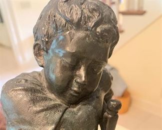 #818E - 13" bronze sculpture of boy sleeping on chair - $125.00