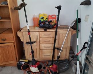 weedeaters $75, shovel $8, chemicals $3, hedge trimmer $22  CABINET IS NOT FOR SALE