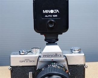 Minolta SRT 201 With Minolta 135mm Lens, Minolta With AF Zoom Lens, And Minolta Auto 128 Flash