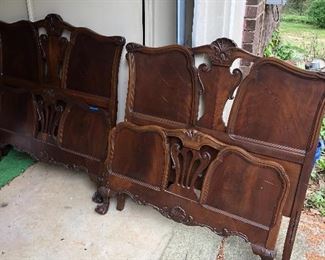 Antique twin beds with wood rails. $200 pair. 