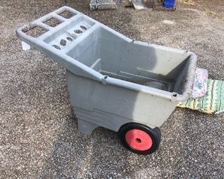 Plastic yard cart. It needs to be cleaned. 