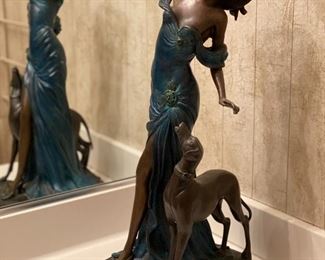Bronze elegant lady and dog 