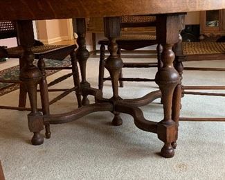 #2	Antique dining table with 4 cane chairs, 3 leaves and pads 48"-78"x48"x28"	 $150.00 
SOLD