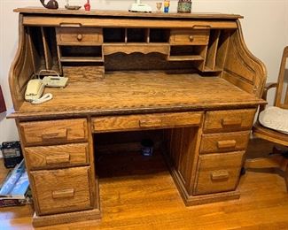 #13	Oak roll top desk 55"x29"x47"	 $75.00 
#14	Oak rolling desk chair	 $35.00 
SOLD