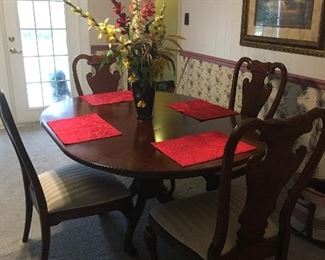 Item Z11 American Drew dining table 4-chairs, and 1 leaf. $300