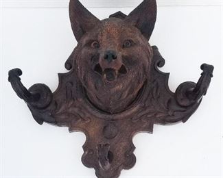 Black Forest Carving 3 of 20. Fox Wall Hat Coat Rack. Carved wood with inset glass eves. Warm patina. 12 x 13.4 x 6 inches. Provenance: This German Austrian Swiss Bavarian Alpine figural carving is one of twenty in the sale from the estate of a New England lifetime collector national business owner retired to central Florida.